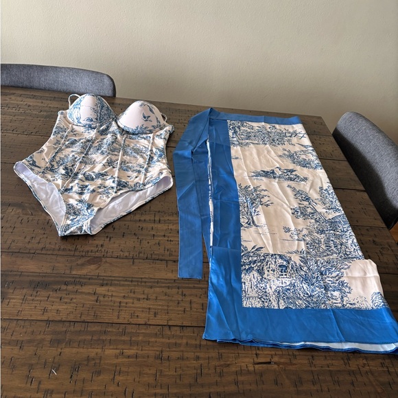 Elegant Blue and Cream Patterned Scarf with matching swimsuit
